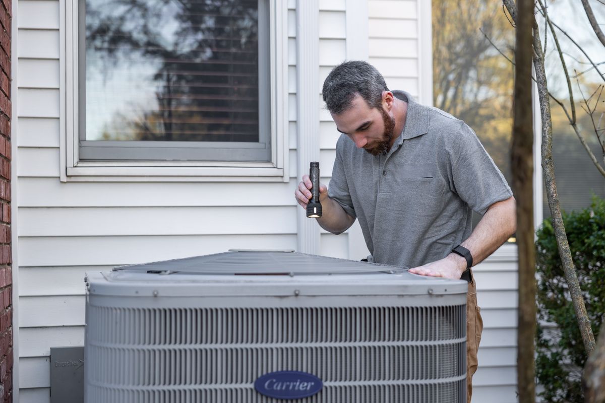 Technician performing air duct inspection in Las Vegas